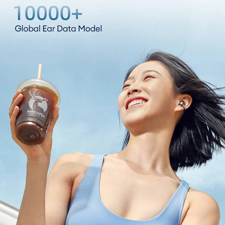 Woman in a sports bra holding a drink with a clear blue sky background, featuring Hyundai branding.